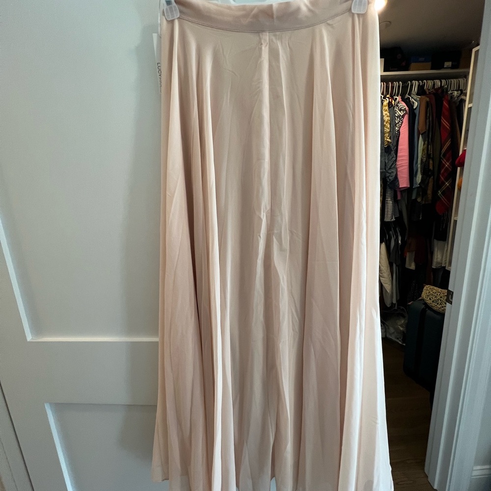 Lucy Paris chiffon blush skirt. New with tags. Never worn. Size MP.